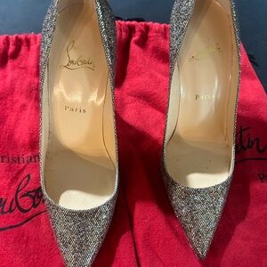Sparkling mixed golds Louboutin high heeled pumps.
